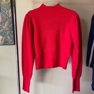 Red knit sweater with balloon arms